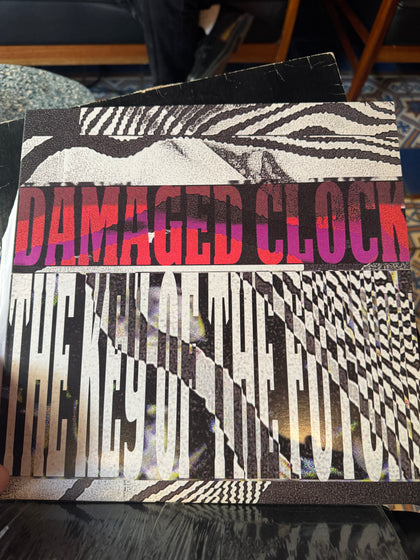 Damaged Clock - The Key Of The Future